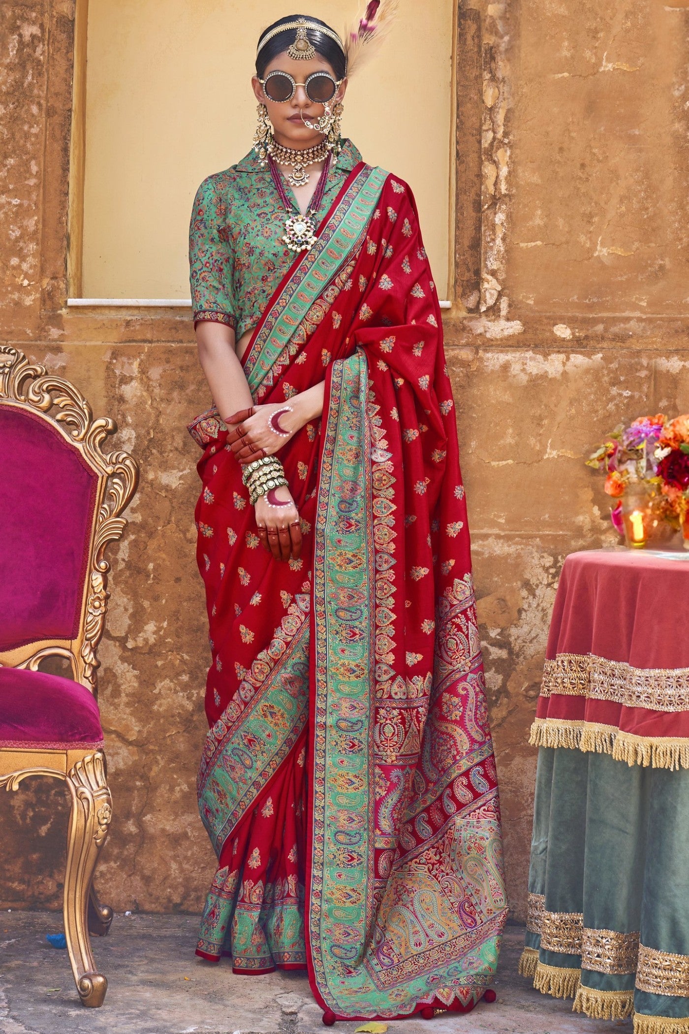 Red Banarasi Jamawar silk saree with gold zari, a classic Bengali bridal choice