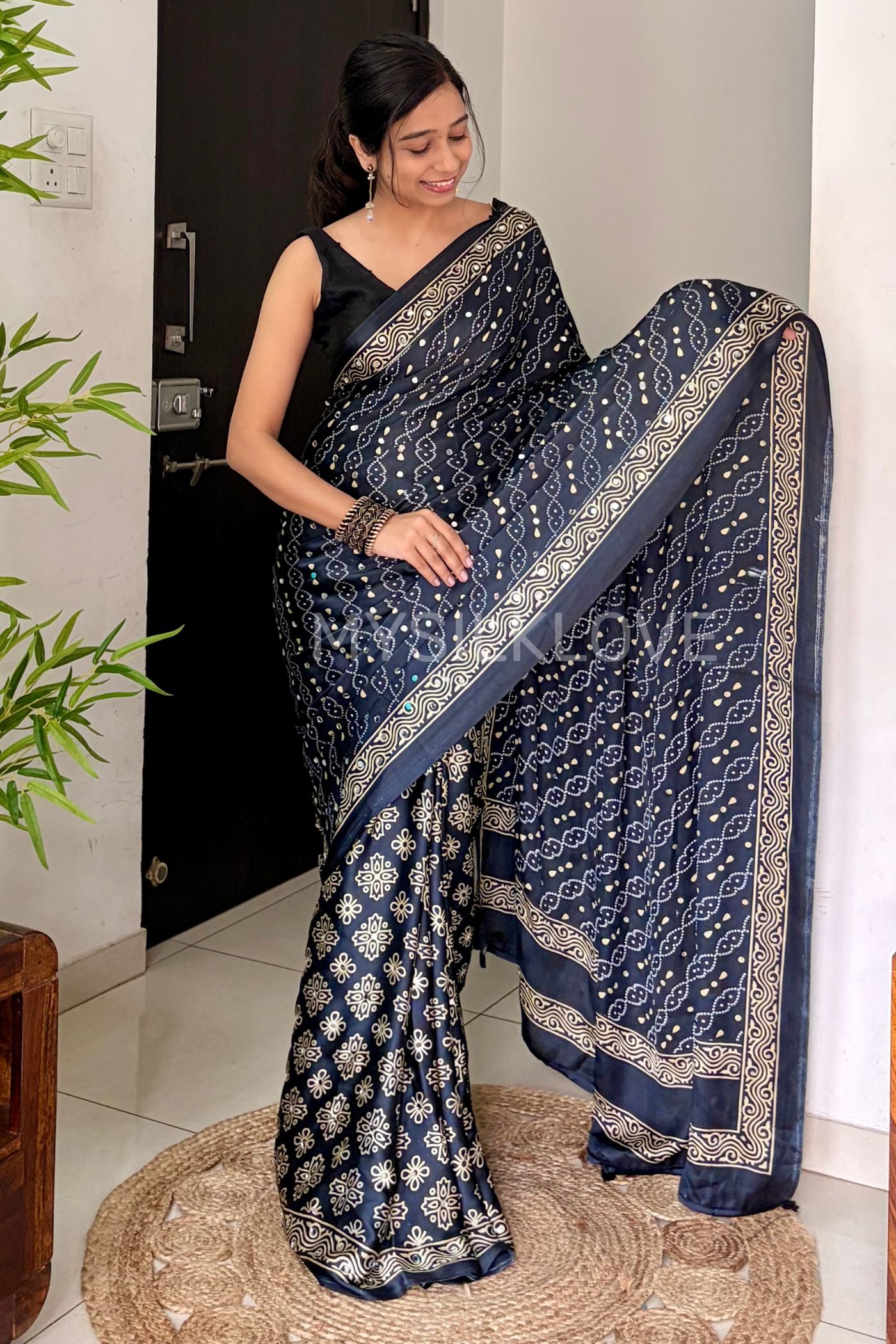 MySilkLove Obsidian Black and Blue Ajrakh Satin Printed Mirror Work Saree
