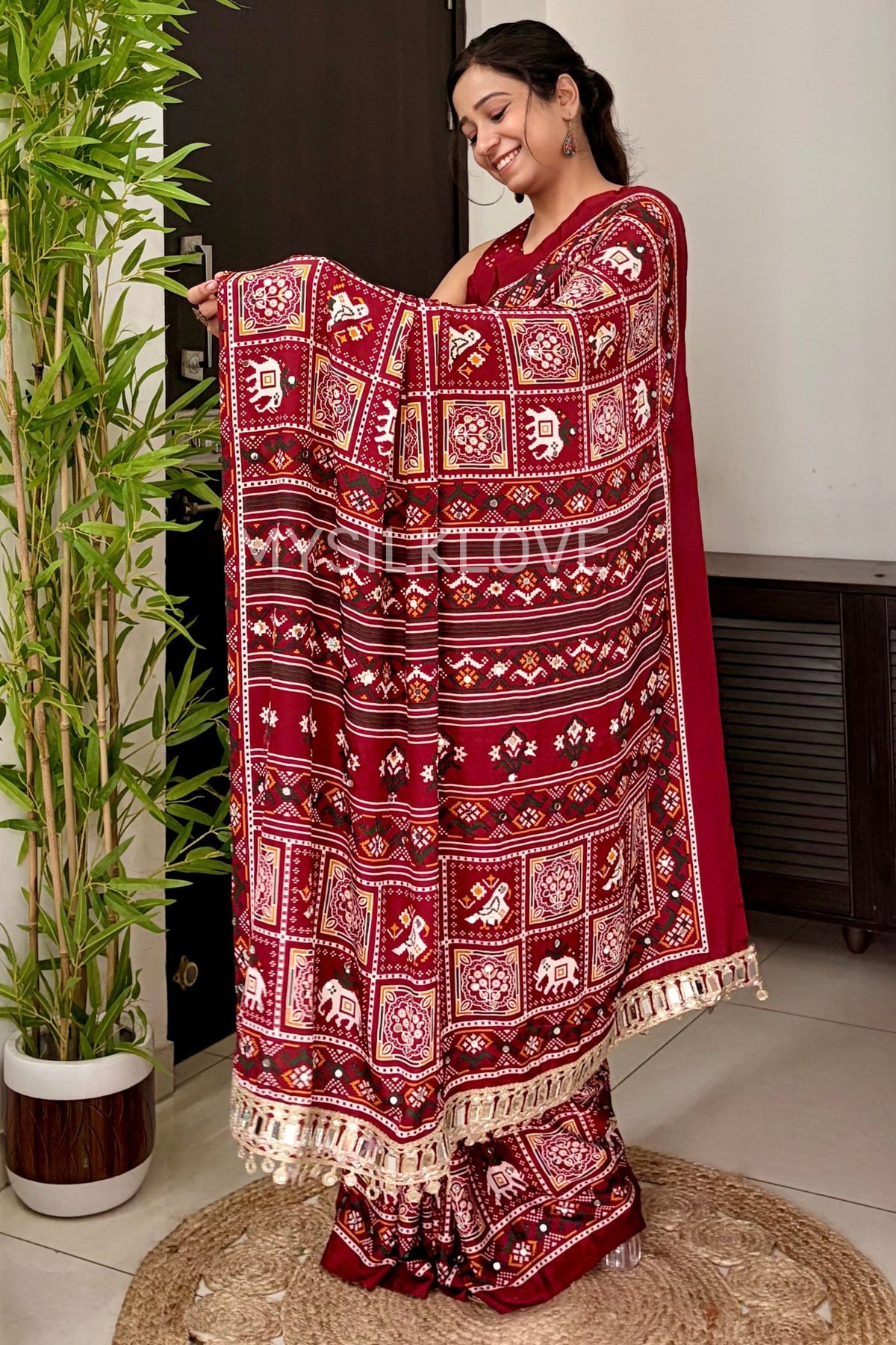 Buy MySilkLove Fiery Maroon Mirror Work Patola Saree with Mirror Work Border Online