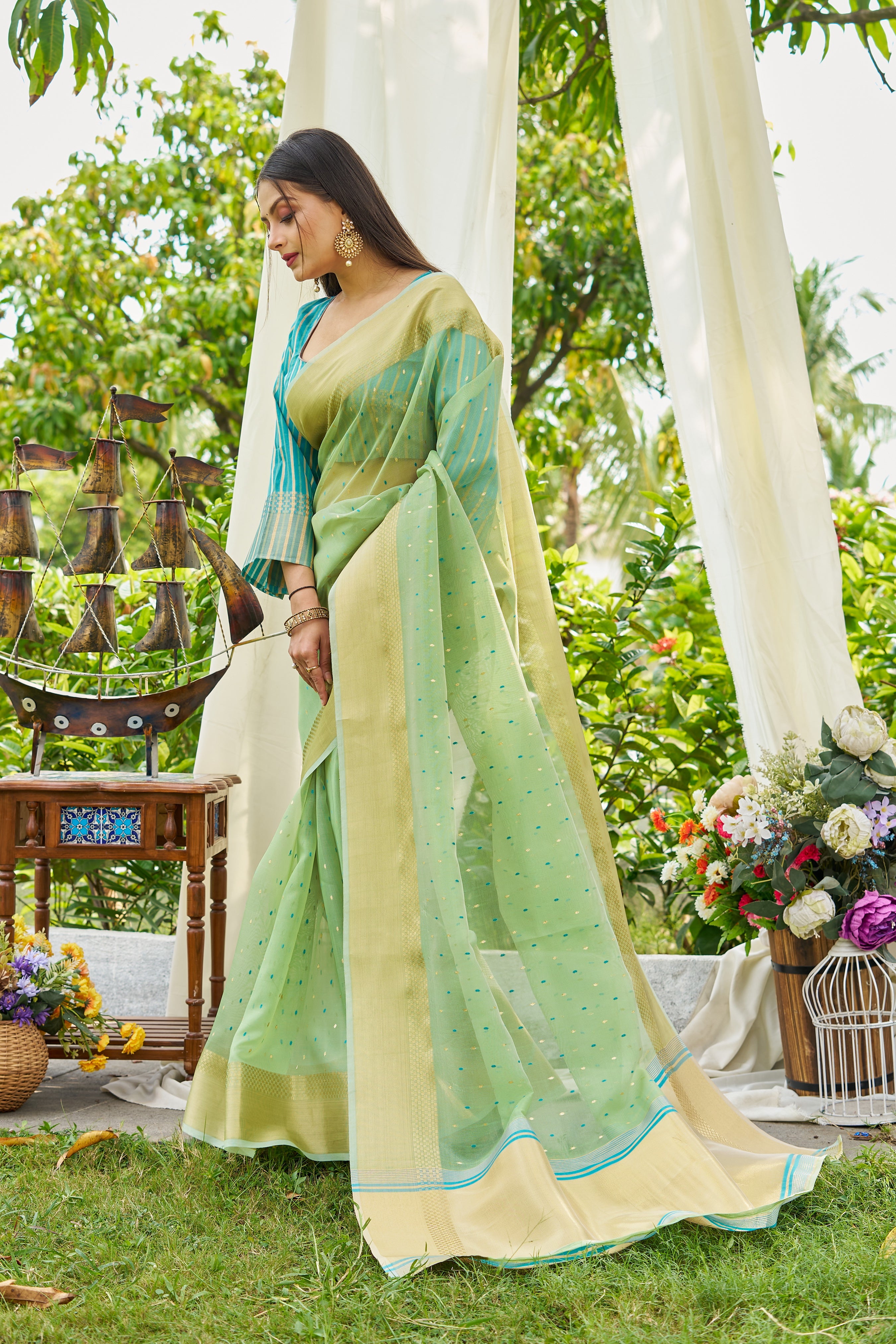 Buy MySilkLove Pista Green Woven Shimmer Silk Saree Online