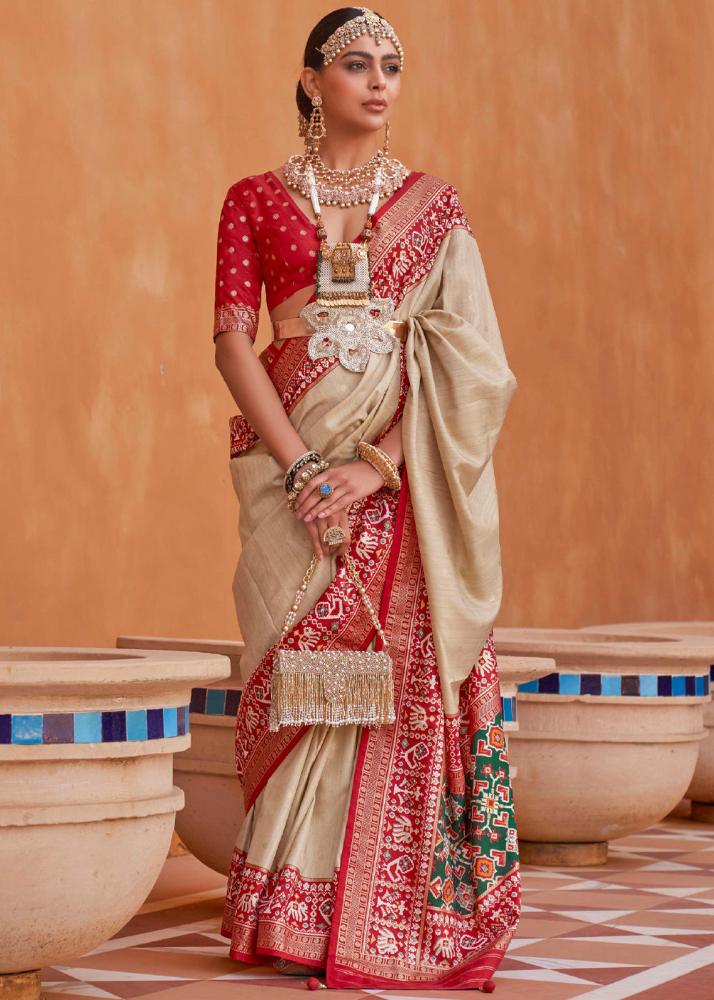 Buy Rodeo Dust Cream and Red Woven Patola Silk Saree Online