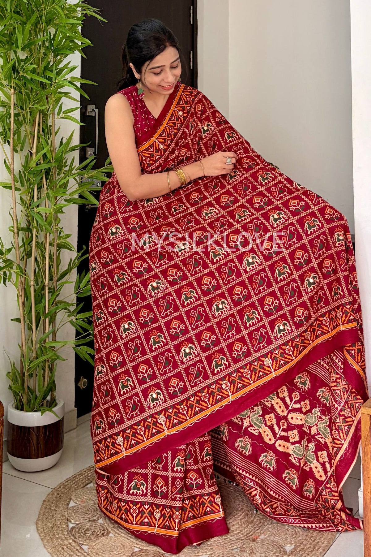 MySilkLove Cherry Red Patola Embroidery Small Mirror Work Handloom Saree