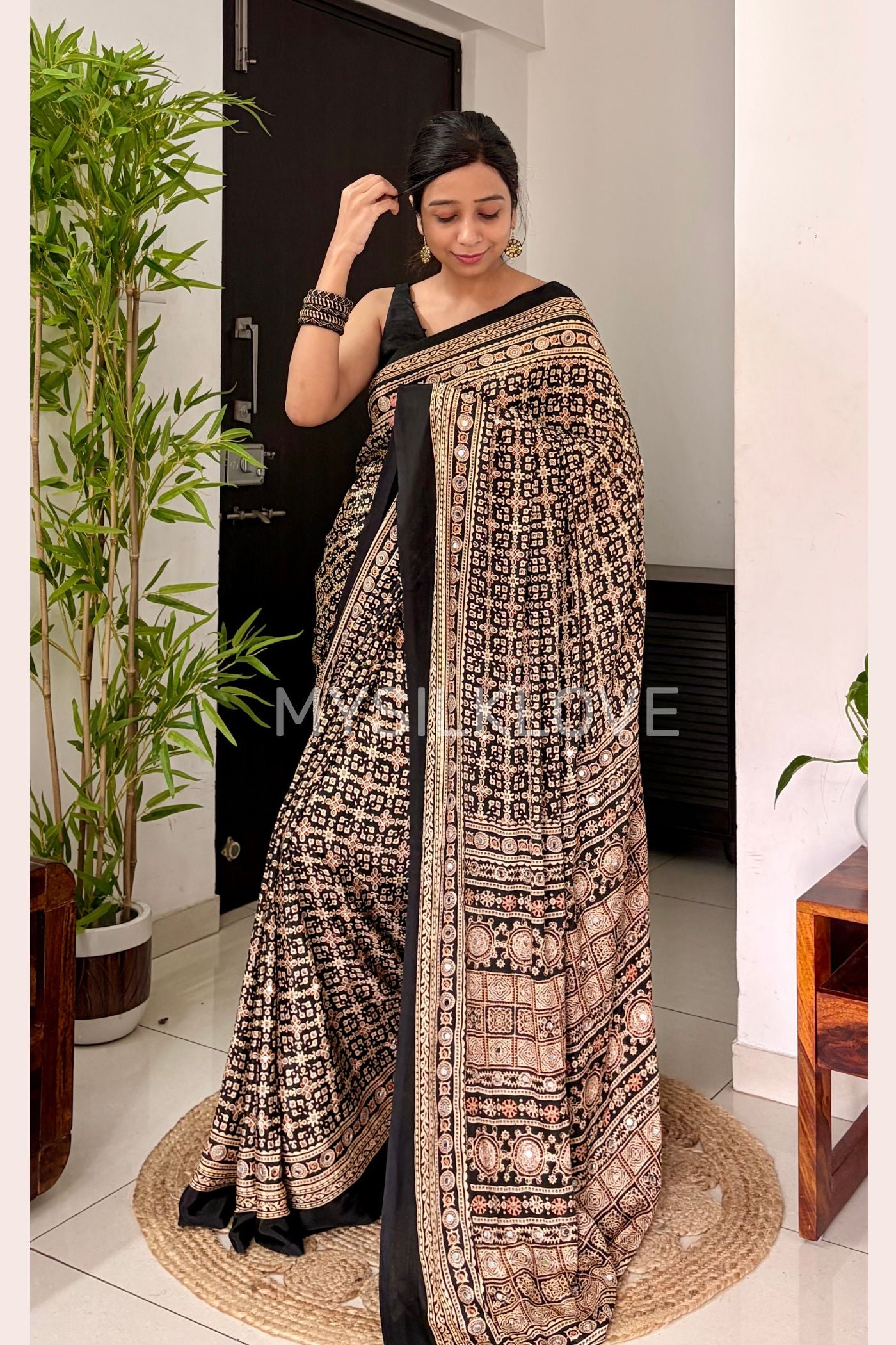 Buy MySilkLove Metal Black Modal Ajrakh Satin Printed Mirror Work Saree Online