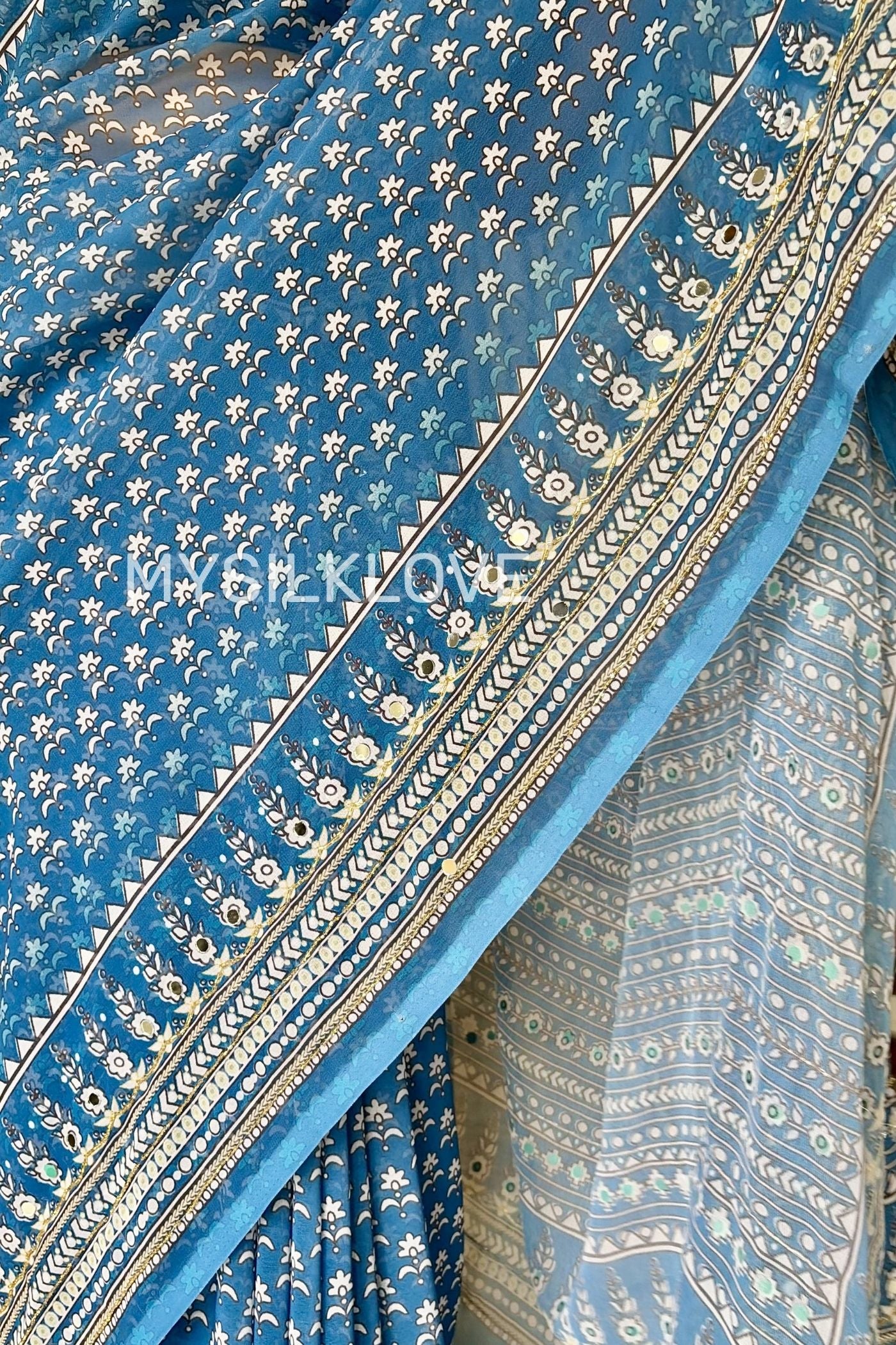 Buy MySilkLove Light Blue Ajrakh Georgette Mirror Work Saree Without Blouse Online