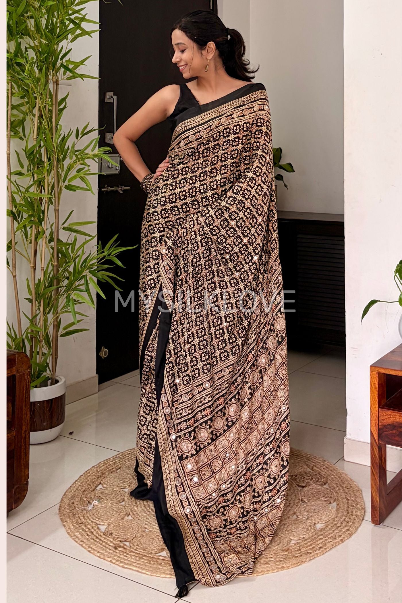 Buy MySilkLove Metal Black Modal Ajrakh Satin Printed Mirror Work Saree Online