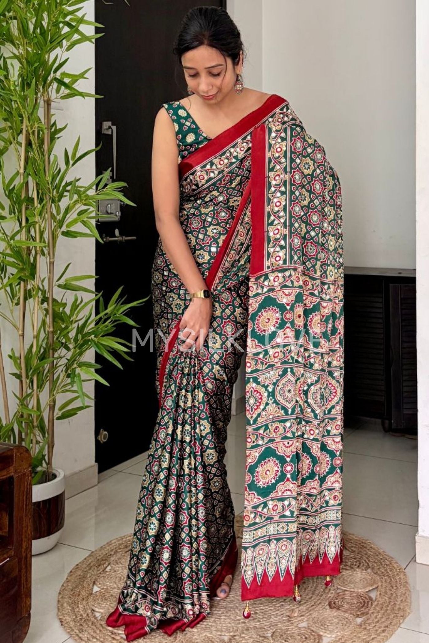 MySilkLove Evergreen and Red Modal Ajrakh Satin Printed Mirror Work Saree