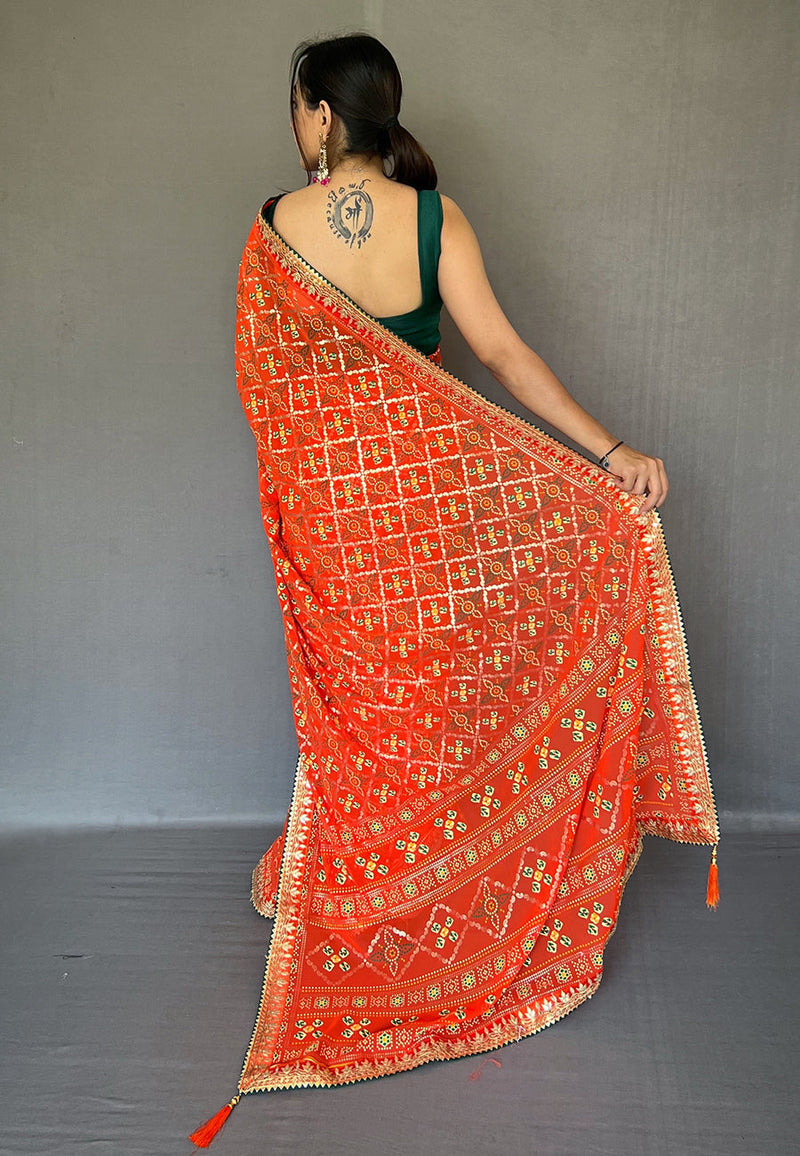 Atomic Orange Embroidered Georgette Bandhani Saree
