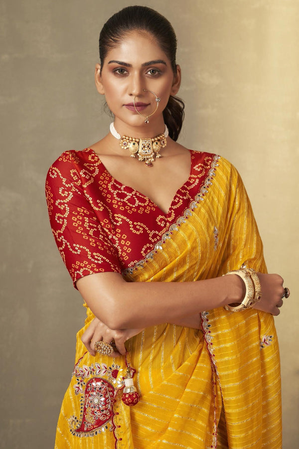 Fuel Yellow and Red Embroidered South Silk Saree with Designer Blouse
