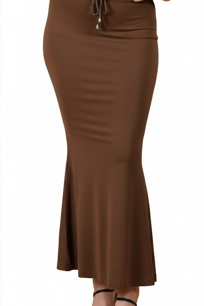 Buy MySilkLove A woman wearing a brown bodycon maxi skirt with a drawstring waistband and black strappy heeled sandals, shown against a plain white background. Online