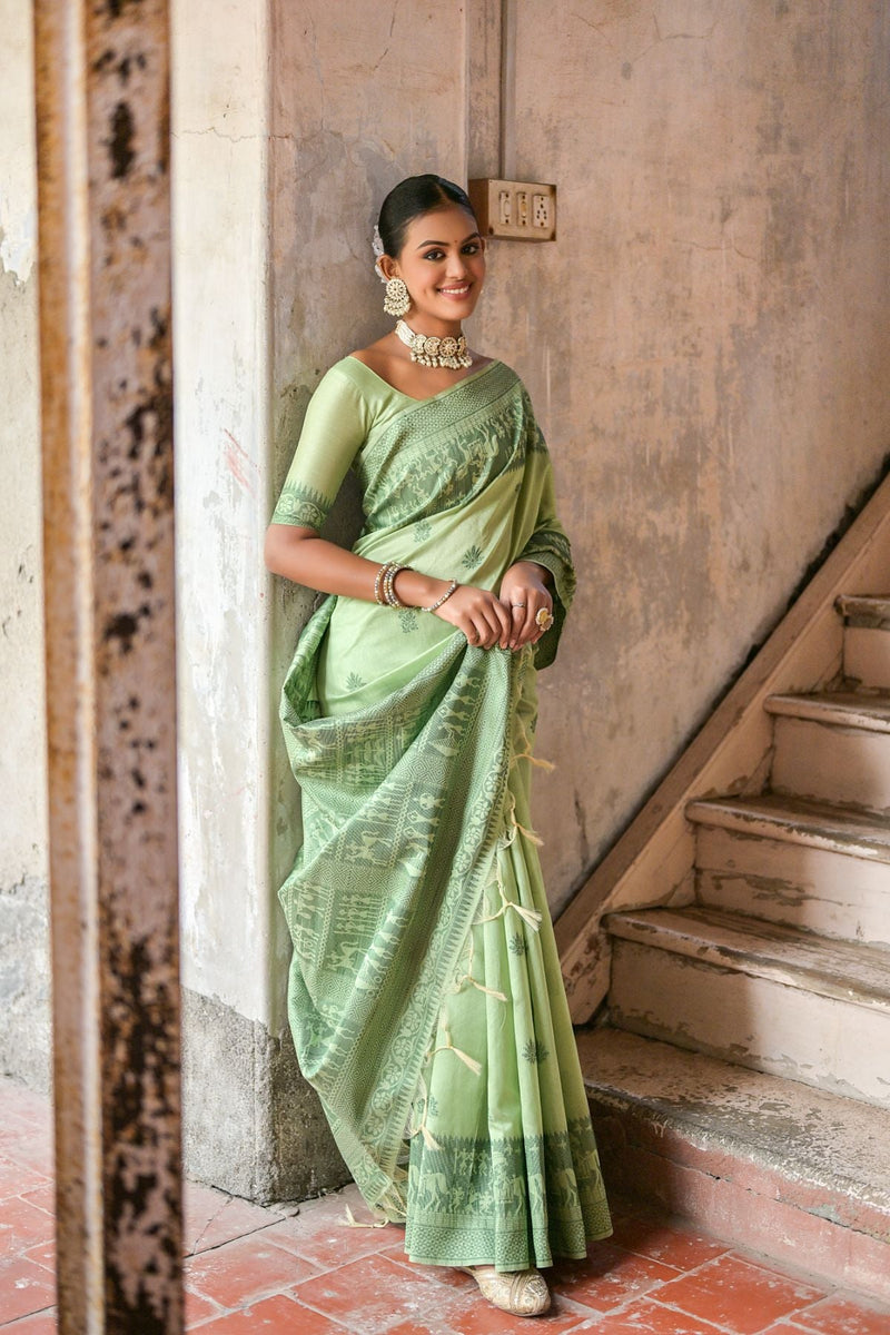 Bottle green color handloom raw silk saree with woven design