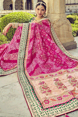 Mystic Pink and Green Zari Woven Patola Saree with Designer Blouse