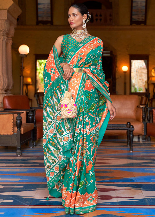 Rajah Orange and Green Woven Patola Silk Saree