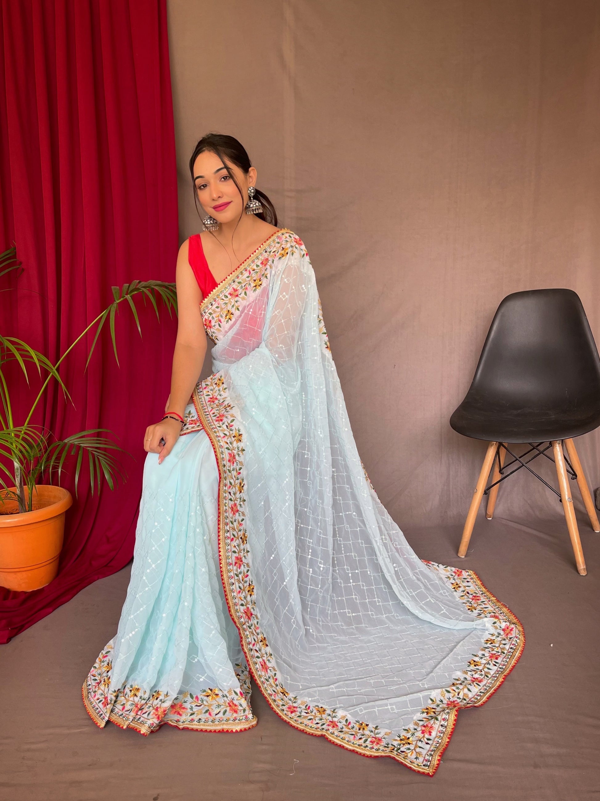 Buy MySilkLove Monsoon Blue Georgette Sequins Designer Saree with Embroidered Border Online