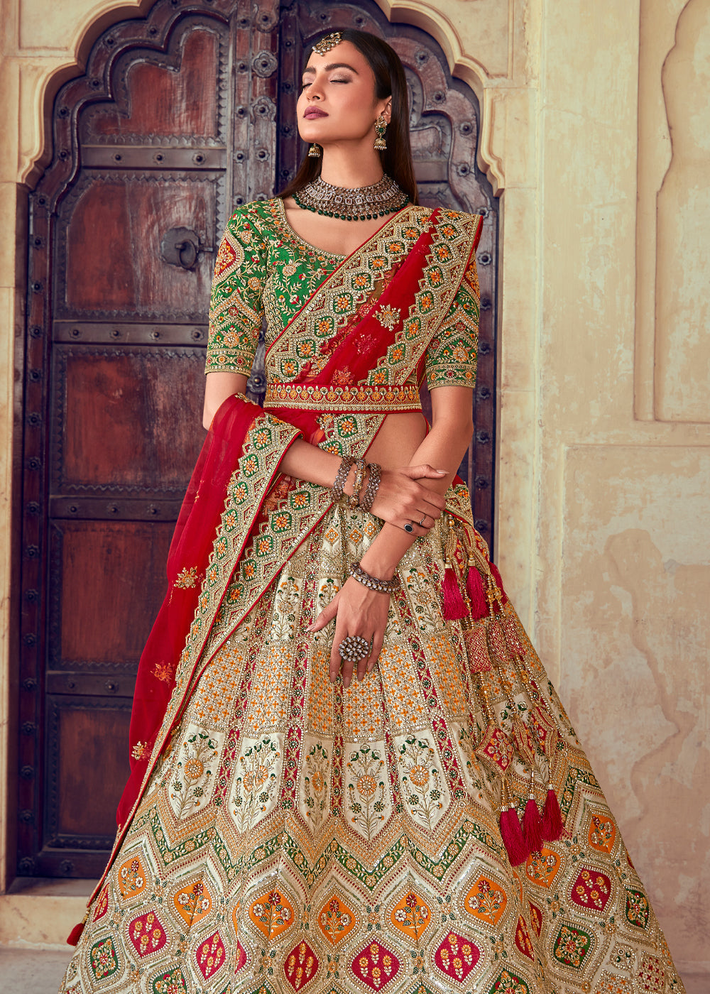 MySilkLove Cognac Red and Green Heavy Embroidered Designer Lehenga