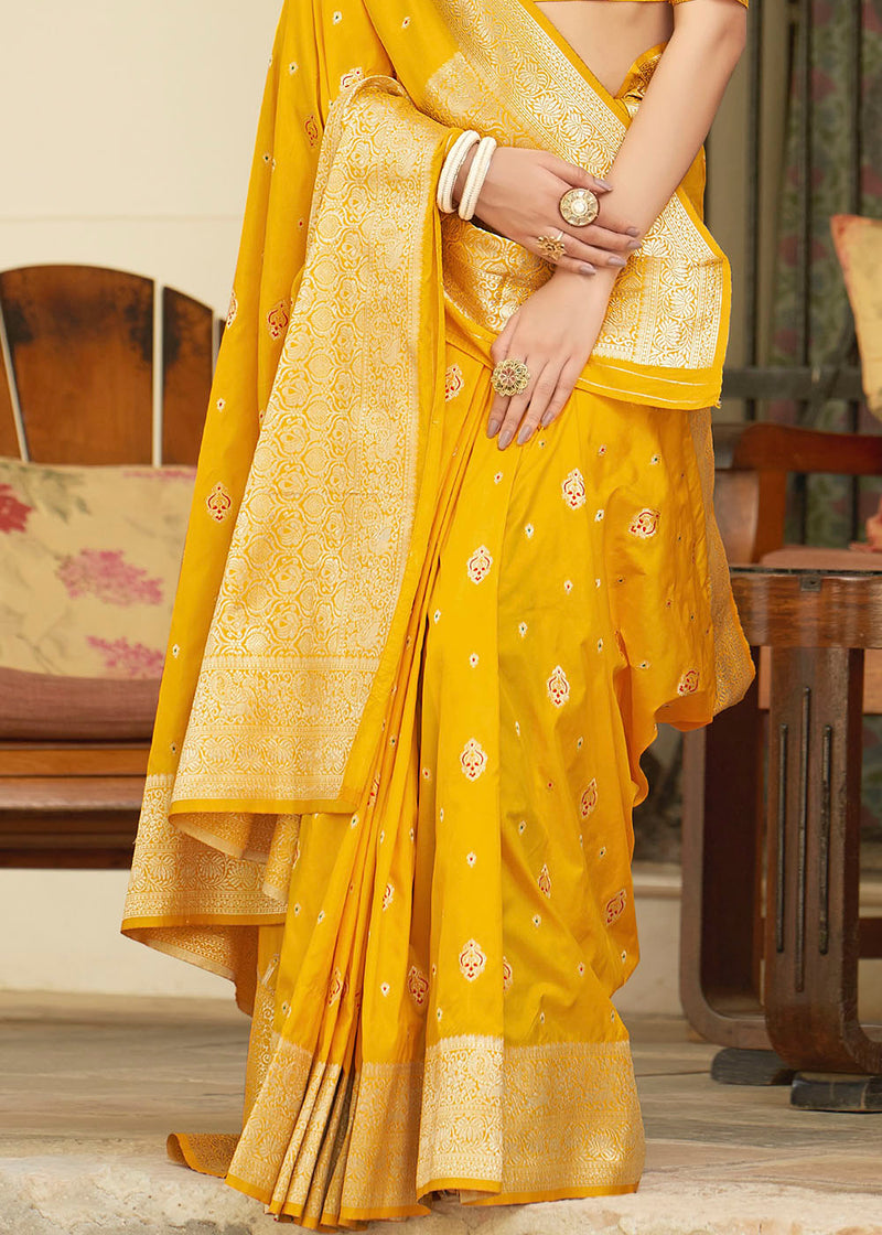 Saffron Yellow Zari Woven Banarasi Silk Saree with Butti Work