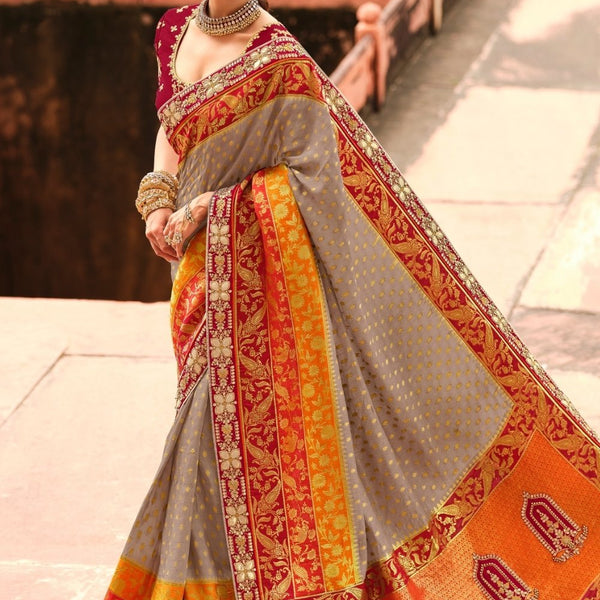 Sandal silk saree with poo chakram buttas, contrast bavanji border &  gleaming pallu of floral ogee design in zari