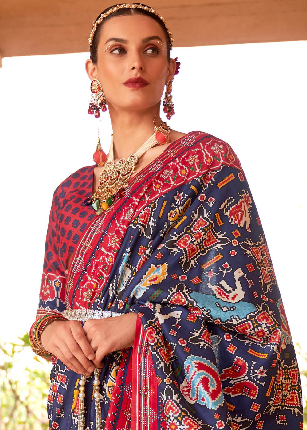 MySilkLove Mulled Wine Blue and Red Printed Patola Saree