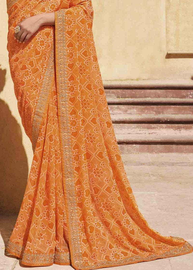 Salomie Orange Patola Print Georgette Saree With Embroidered Blouse