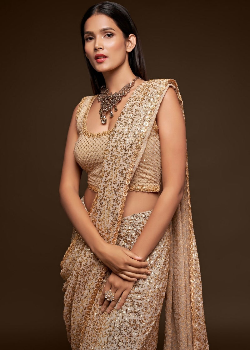 Golden saree party clearance wear